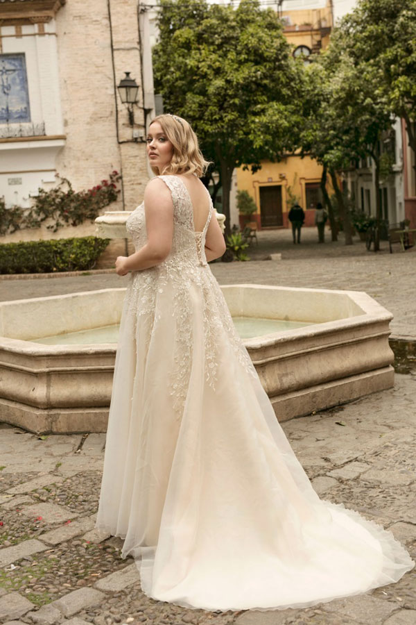 Plus size wedding dress 18-24. Lace illusion neckline with soft tulle skirt.