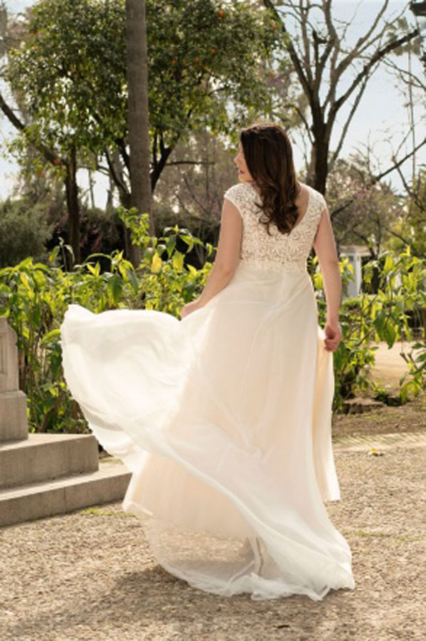 Plus size wedding dress 18-24. Silk organza skirt with embroidered lace bodice.