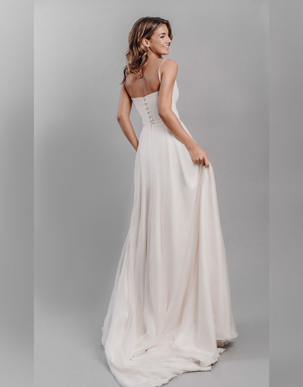 Liberty. A simply stunning understated dress.  Liberty has a plunging sweetheart crepe bodice and a full circle chiffon skirt and is subtly finished with a hint of satin around the waist and strap detail.  A perfectly elegant and classic wedding dress silhouette.